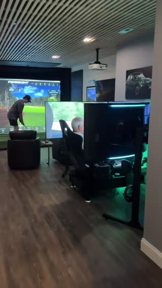 How great is this space with a racing simulator and golf simulator  Video credit @Podium 1 Racing  Re-create this room by visiting the @mr.mancaving website, link in bio  #racingsimulator #golfsimulator #mancave #gameroom #gamesroom 
