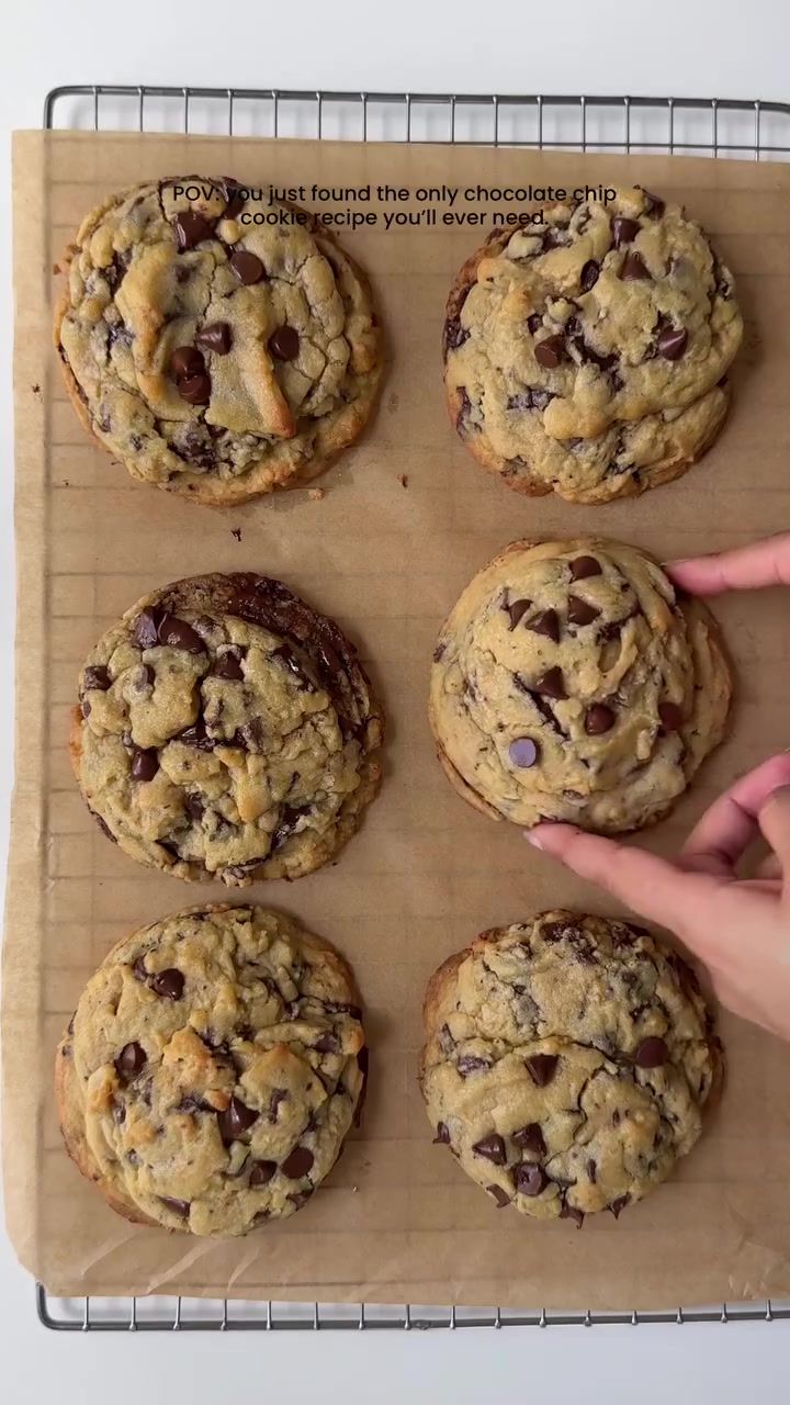 Nyc style thick chocolate chip cookies 🍪 

Ingredients 

2 1/4 (285g) cups all purpose flour 
1/4 tsp baking soda
1/2 tsp baking powder 
1 tbsp corn starch 
1 cup (200g) dark brown sugar 
3 tbsp (37g) granulated sugar 
1 egg + 1 egg yolk, cold
1 cup (225g) unsalted butter, cold 
1 tbsp vanilla bean paste
1 cup (250g) semi sweet chocolate chips 
1/2 cup (125g) milk chocolate chunks
Pinch of salt
1/2 tsp espresso powder coffee 

Method:

In a bowl or stand mixer add cubed cold butter. Beat on high until creamy for about 2 min. Add in brown sugar and granulated sugar. Beat again for 2-3 min on high until well combined. Add in the egg and egg yolk along with the with vanilla bean paste. Mix on high for 3-4 min until everything is well incorporated.

In a separate bowl add all purpose flour, baking powder, baking soda, salt, corn starch,instant coffee. Mix to combine.
Gradually add dry ingredients to the wet mixture. Add in chocolate. Mix until just combined, do not over mix the batter at this stage.
Scoop 4 ounces tall cookie dough balls on baking sheet. 
Freeze the dough balls for at least 2 hours or overnight.

Pre heat oven to 350 F. Place 3-4 cookies on a prepared baking sheet, leaving approximately 4 inches of space in between each cookie. Bake for 16-18 min or until the edges are golden and crispy and center is chewy and soft. Let cool completely before serving and enjoy.

#cookie #chocolatechipcookies