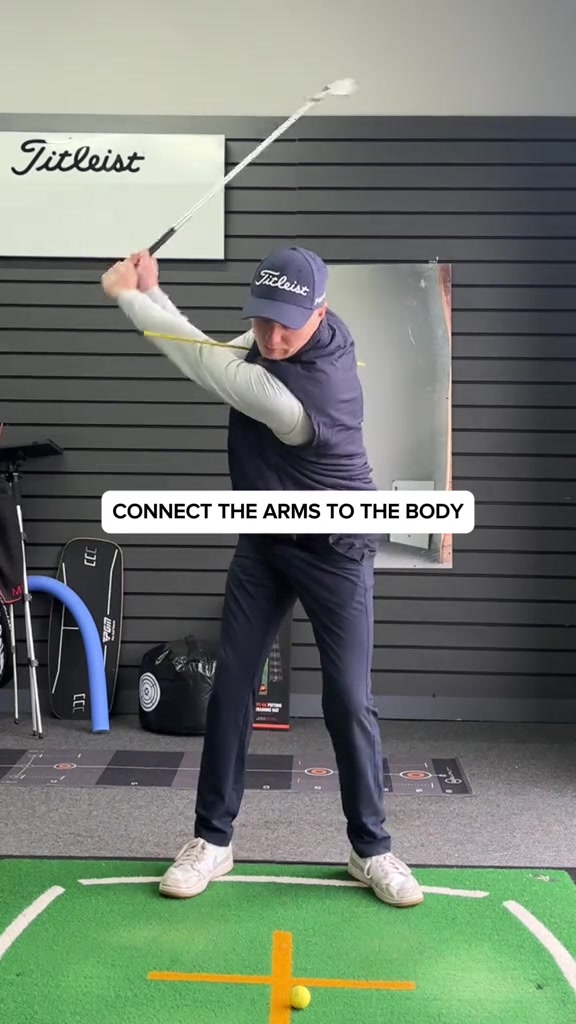 Struggling to control your strike path Check your arm structure When the arms separate from the body the club can approach the ball from inconsistent directions making solid contact far harder than it should be This constraint trains the relationship between the arms and torso helping you stabilise the path and control low point Simple feel Serious transfer Follow for more effective coaching golf golfcoach golfdrills pga pgatour