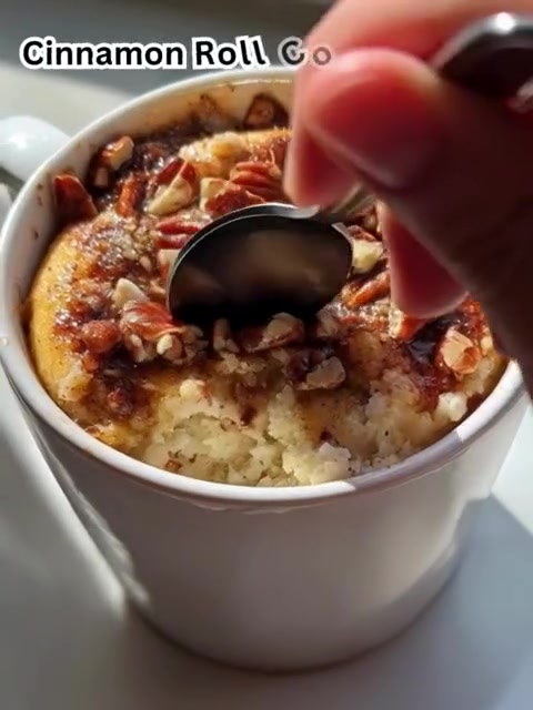 Cinnamon Roll Cottage Cheese Mug Cake 🍰✨ – Quick, Delicious & High-Protein

Ingredients (makes 1 mug cake):
1/2 cup cottage cheese
1/4 cup almond flour
1 tablespoon maple syrup
1/2 teaspoon cinnamon
1/4 teaspoon baking powder
1/4 teaspoon vanilla extract
1 tablespoon chopped pecans (optional)

Nutrition info (per serving): ~300 kcal | 20g protein | 12g fat | 28g carbs

Directions:
Step 1: In a microwave-safe mug, combine cottage cheese, almond flour, maple syrup, cinnamon, baking powder, and vanilla extract. Mix until smooth.
Step 2: If using, stir in chopped pecans for added texture and flavor.
Step 3: Microwave the mug for about 1-2 minutes, or until the cake has risen and is set in the middle.
Step 4: Let cool for a minute before enjoying directly from the mug or transferring to a plate.

Prep Time: 5 min | Cook Time: 2 min | Total: 7 min

Tips for Success:
For a sweeter taste, adjust the maple syrup to your liking.
Enjoy warm for the best flavor, and feel free to top with additional maple syrup or a dollop of yogurt.